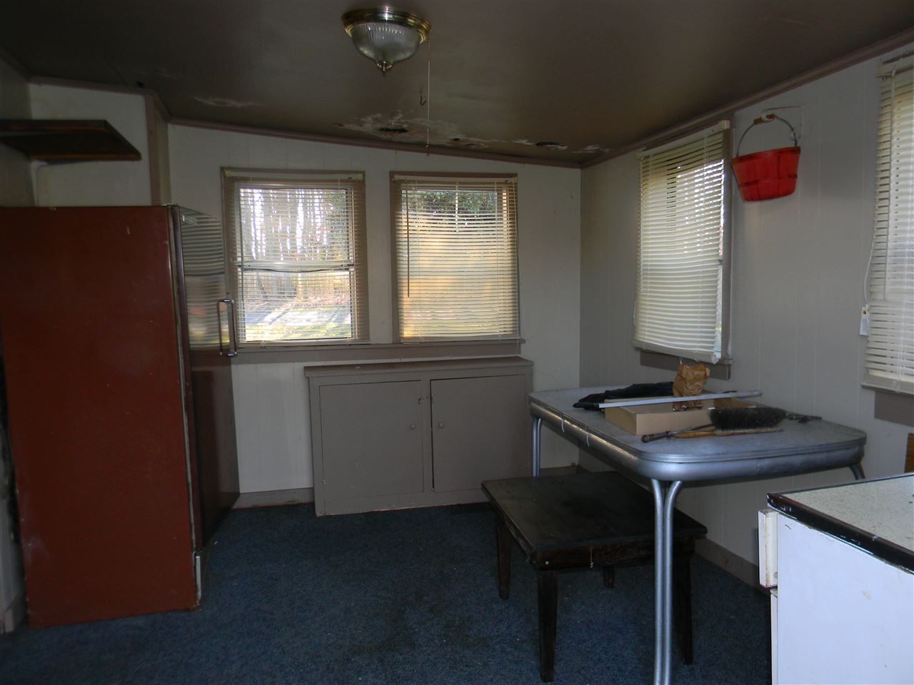 10063 Everona Road Unionville, VA 22567 - Photo 13 of 41 The dining room also has a lot of windows - 2 at the end, 2 on the side. The 3rd side has a door.