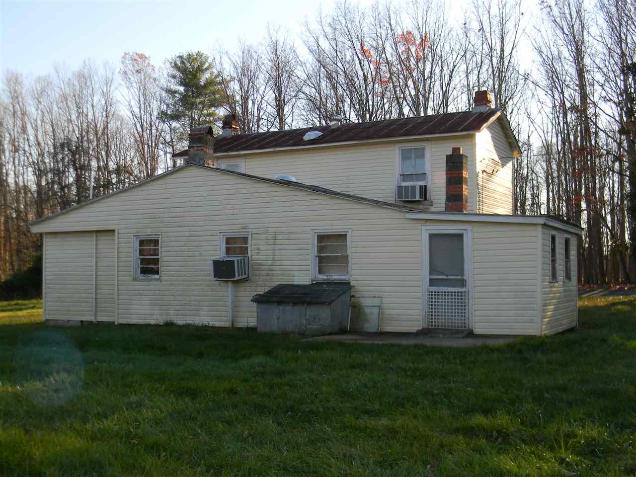 10063 Everona Road Unionville, VA 22567 - Photo 15 of 41 Here's the back of the home outside the dining room.