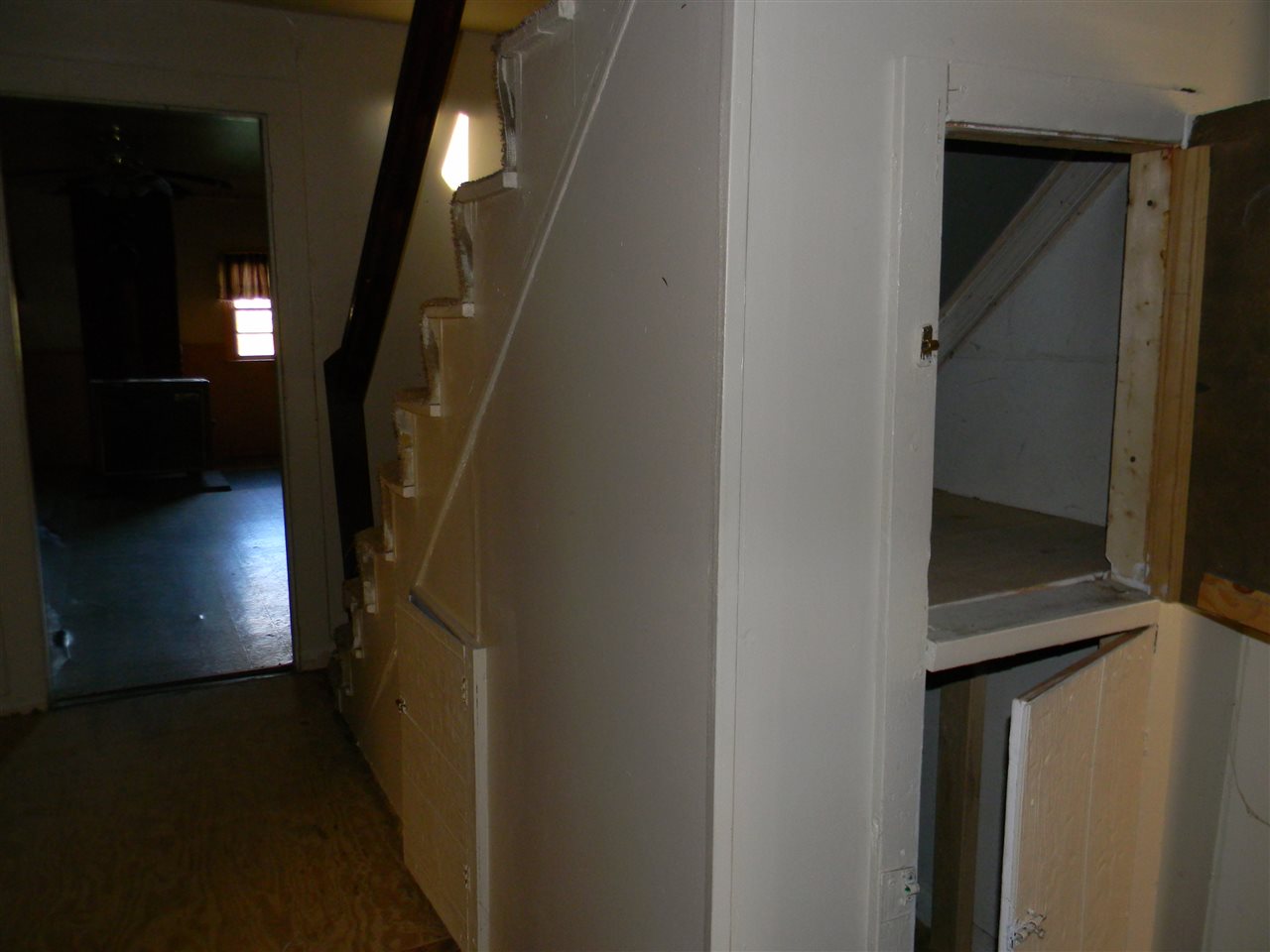 10063 Everona Road Unionville, VA 22567 - Photo 8 of 41 Inside, the space under the stairs has been converted to storage units.