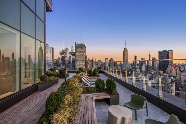 a view of a balcony with chairs