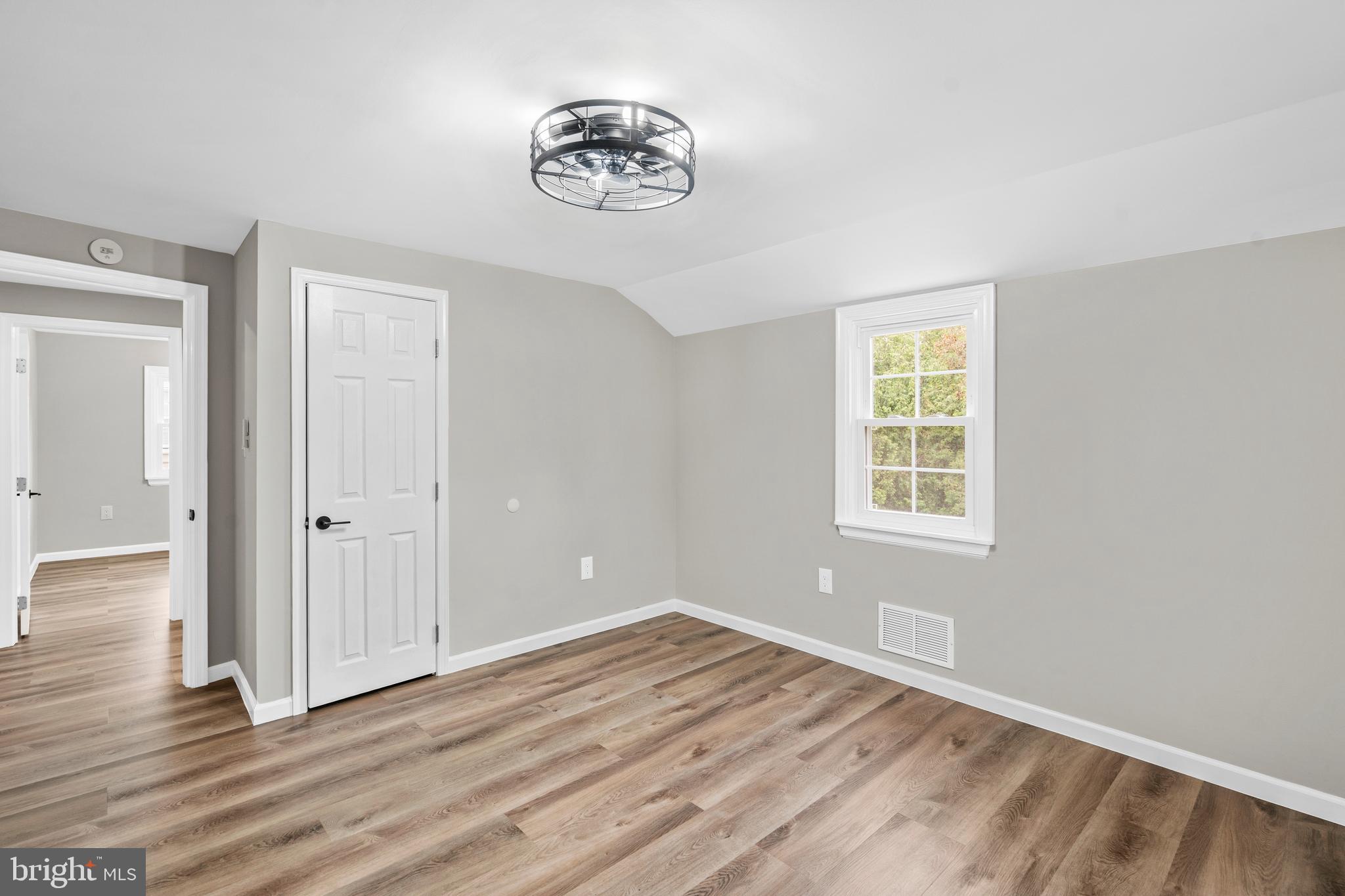 104 Atwood Road Flourtown, PA 19031 - Photo 26 of 52 a view of a livingroom with wooden floor and a window