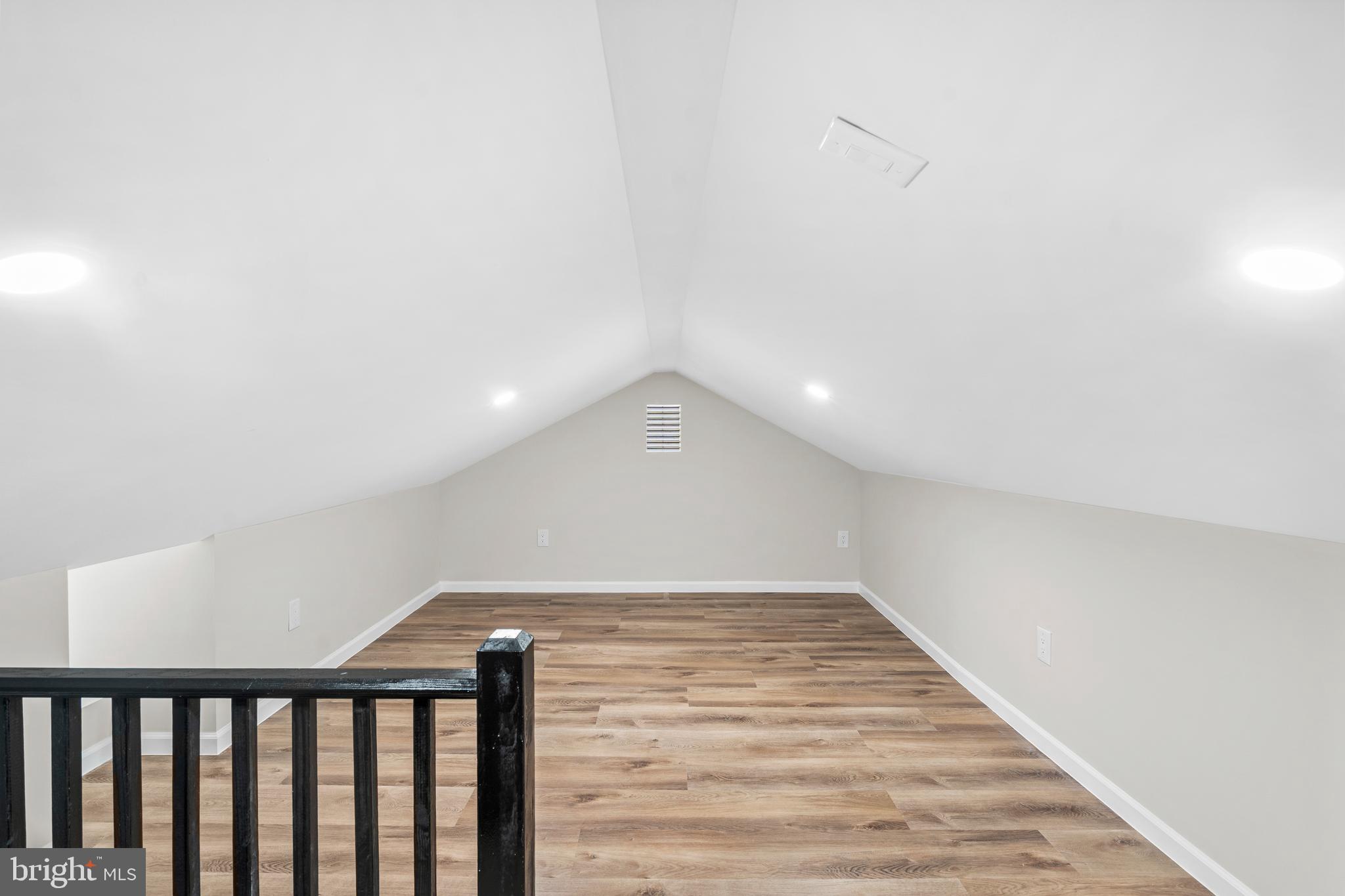 104 Atwood Road Flourtown, PA 19031 - Photo 33 of 52 a view of a hallway with wooden floor