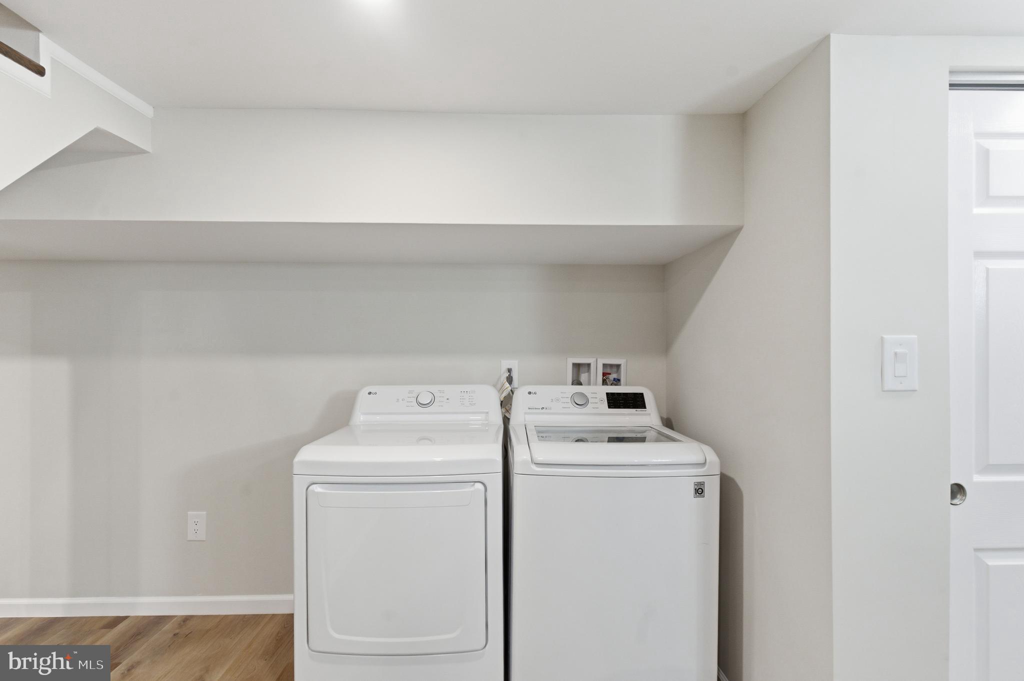 104 Atwood Road Flourtown, PA 19031 - Photo 41 of 52 a utility room with dryer and washer