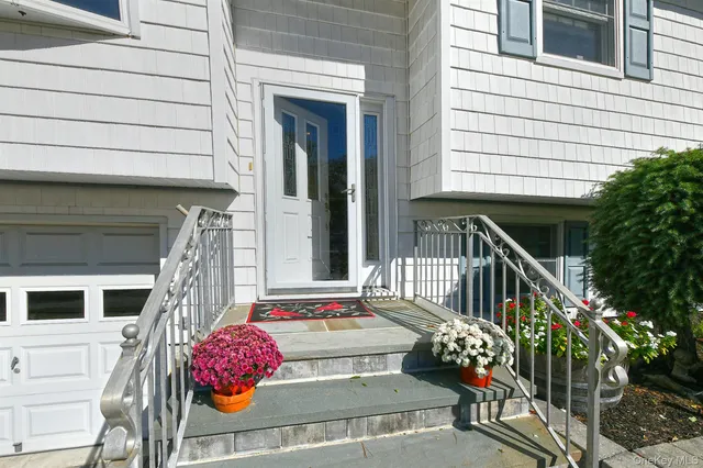 a view of balcony with furniture