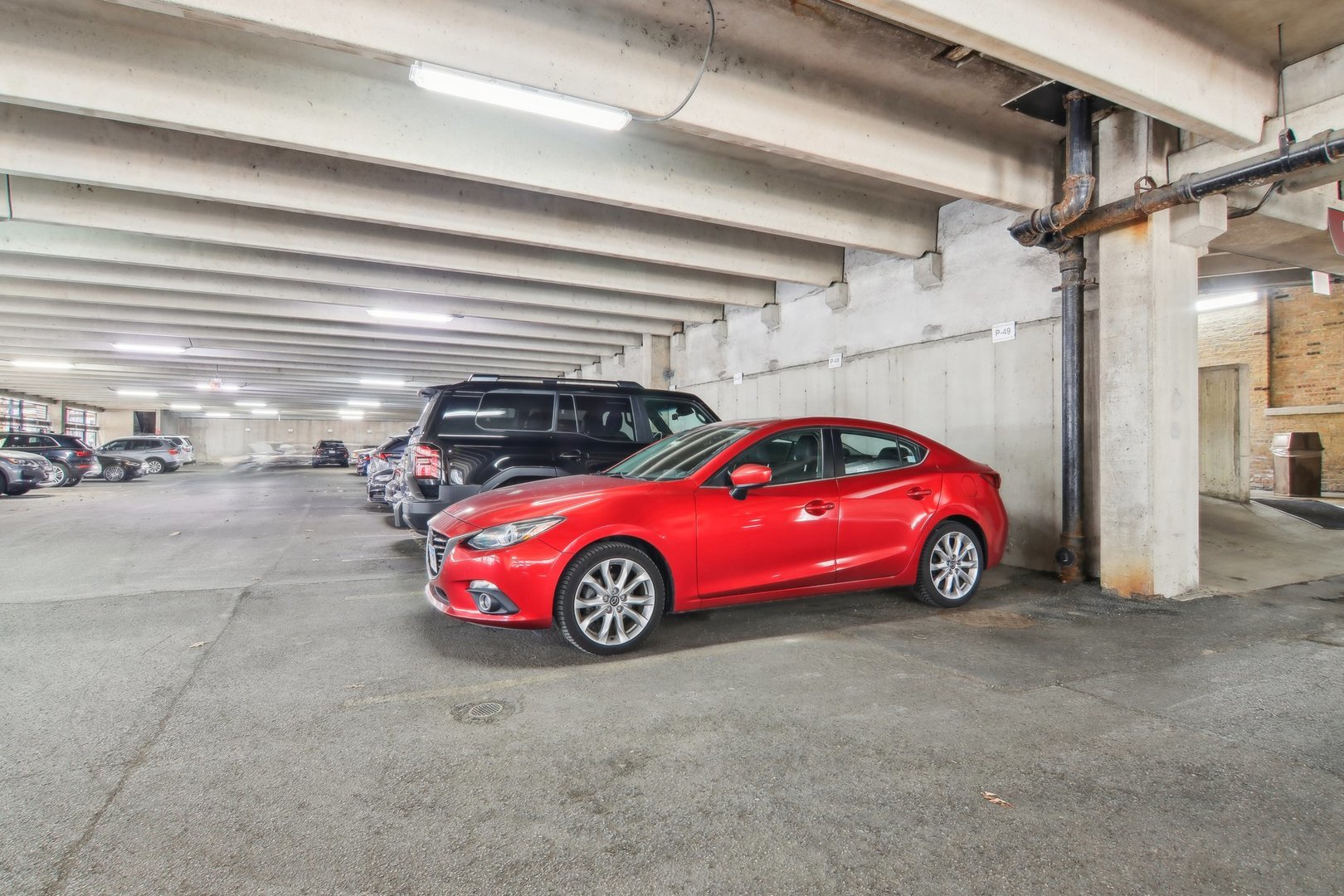 226 North Clinton Street, Unit 216 Chicago, IL 60661 - Photo 17 of 21 a view of a car in garage
