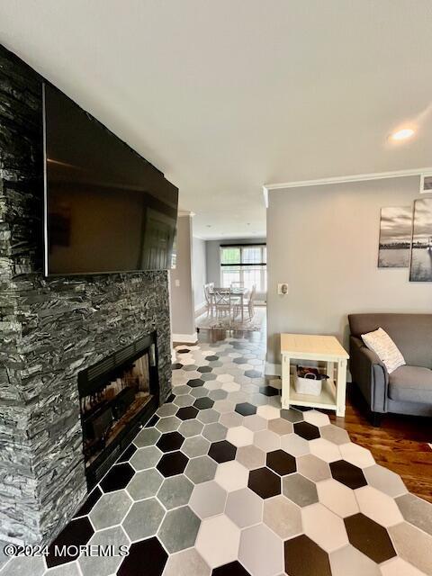 280 Schooner Road Manahawkin, NJ 08050 - Photo 4 of 21 a living room with a fireplace a flat screen tv and a window
