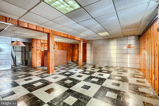 a view of a patio with a table and chairs