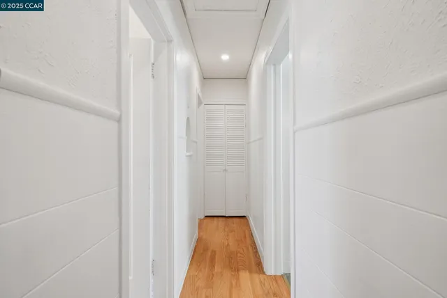 a bedroom with a bed and a stove