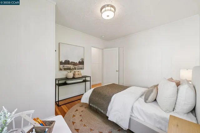 a bathroom with a bathtub sink and mirror