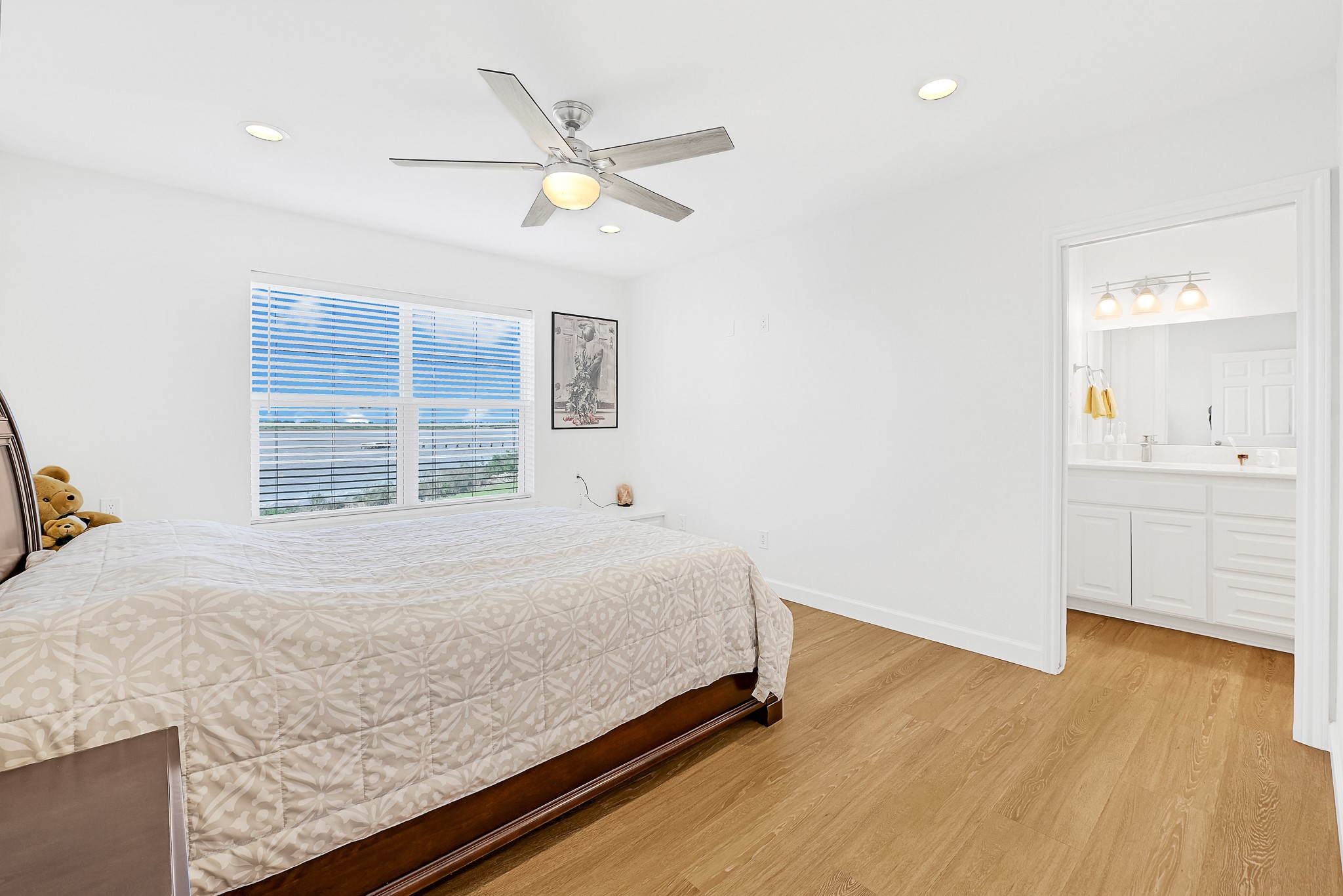 747 Waypoint Drive Palacios, TX 77465 - Photo 24 of 45 a bedroom with a bed and a window