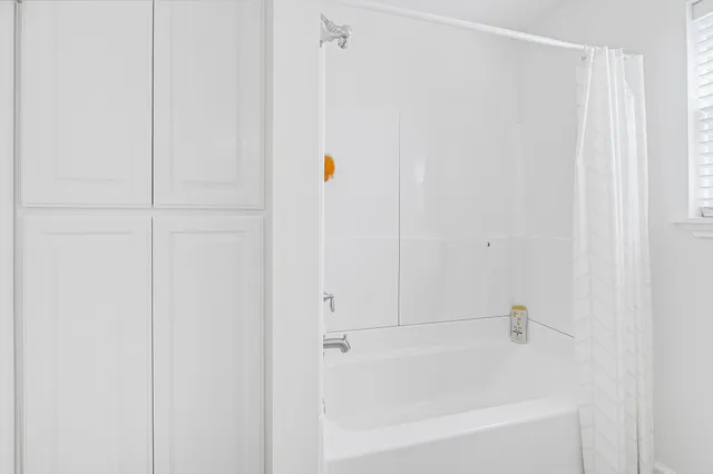 a bathroom with a bathtub