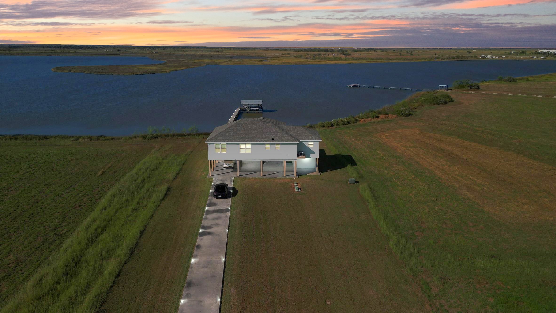 747 Waypoint Drive Palacios, TX 77465 - Photo 4 of 45 a view of a lake from a balcony