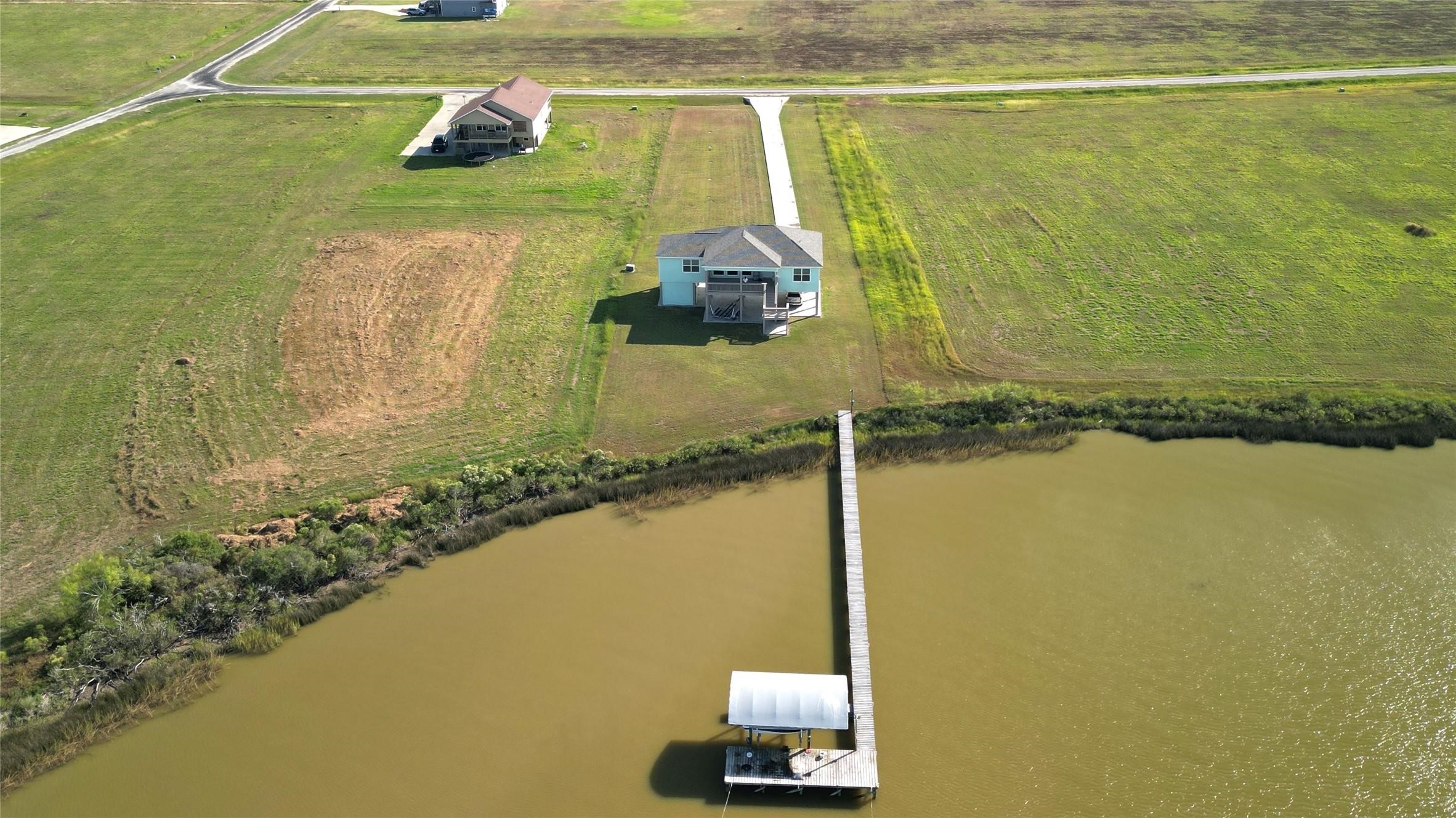 747 Waypoint Drive Palacios, TX 77465 - Photo 42 of 45 a picture of a lake view