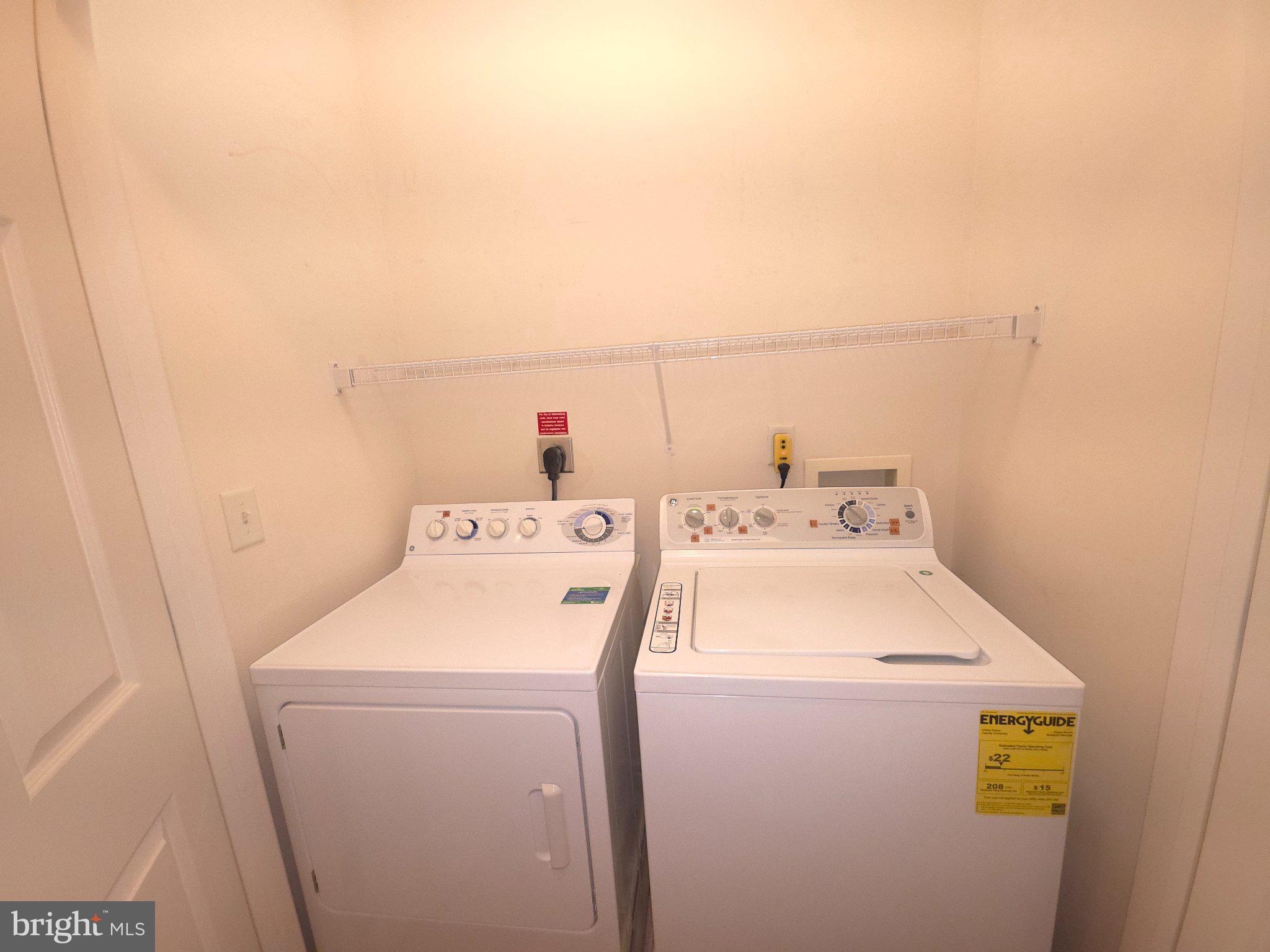 7 Booth Street, Unit 308 Gaithersburg, MD 20878 - Photo 14 of 21 a utility room with dryer and washer