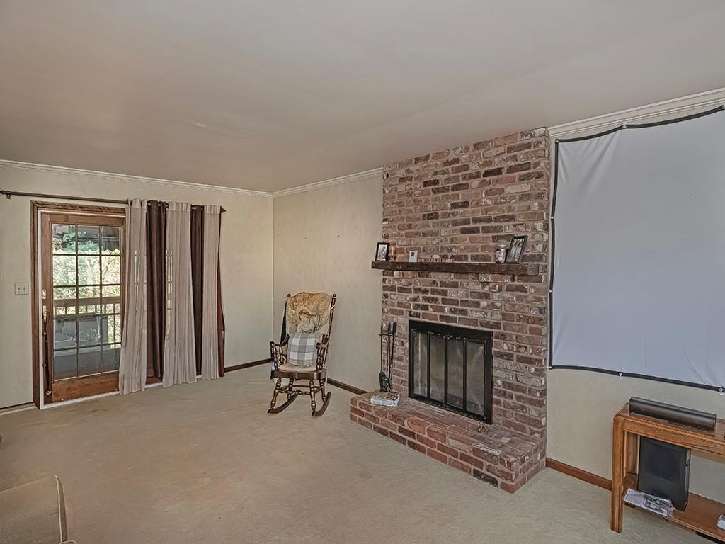 380 Woodland Road Apollo, PA 15613 - Photo 18 of 28 a living room with furniture and a fireplace