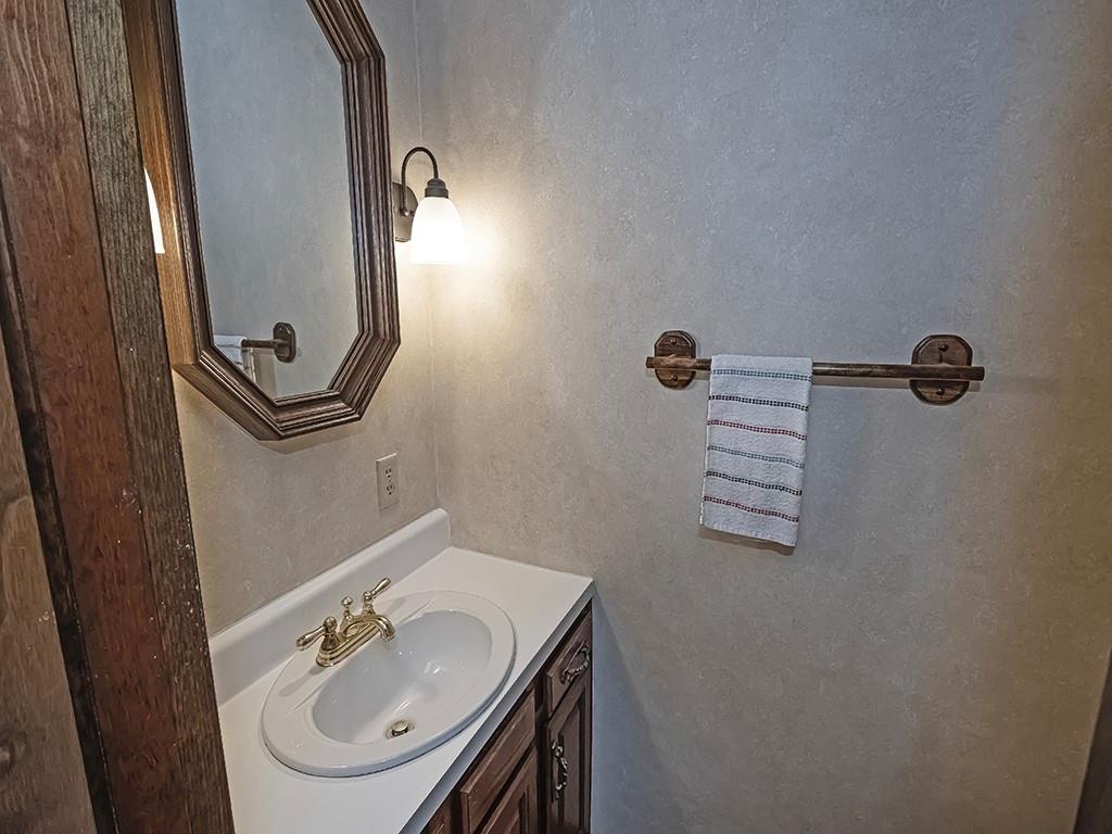 380 Woodland Road Apollo, PA 15613 - Photo 28 of 28 a bathroom with a sink a mirror and vanity