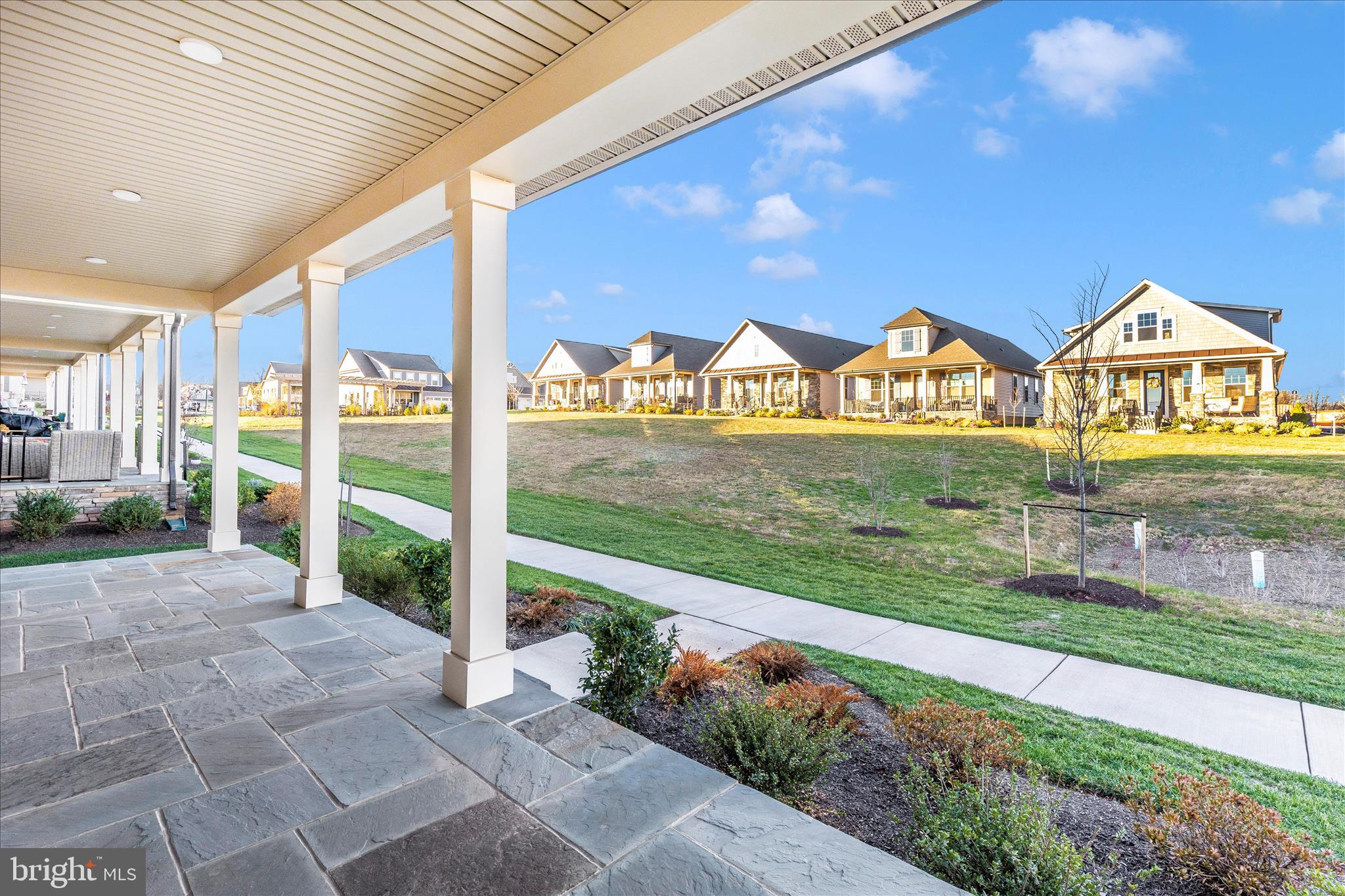413 Bucklebury Lane Frederick, MD 21702 - Photo 3 of 58 a view of an entrance to house with yard and green space
