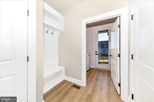 a view of a hallway with staircase