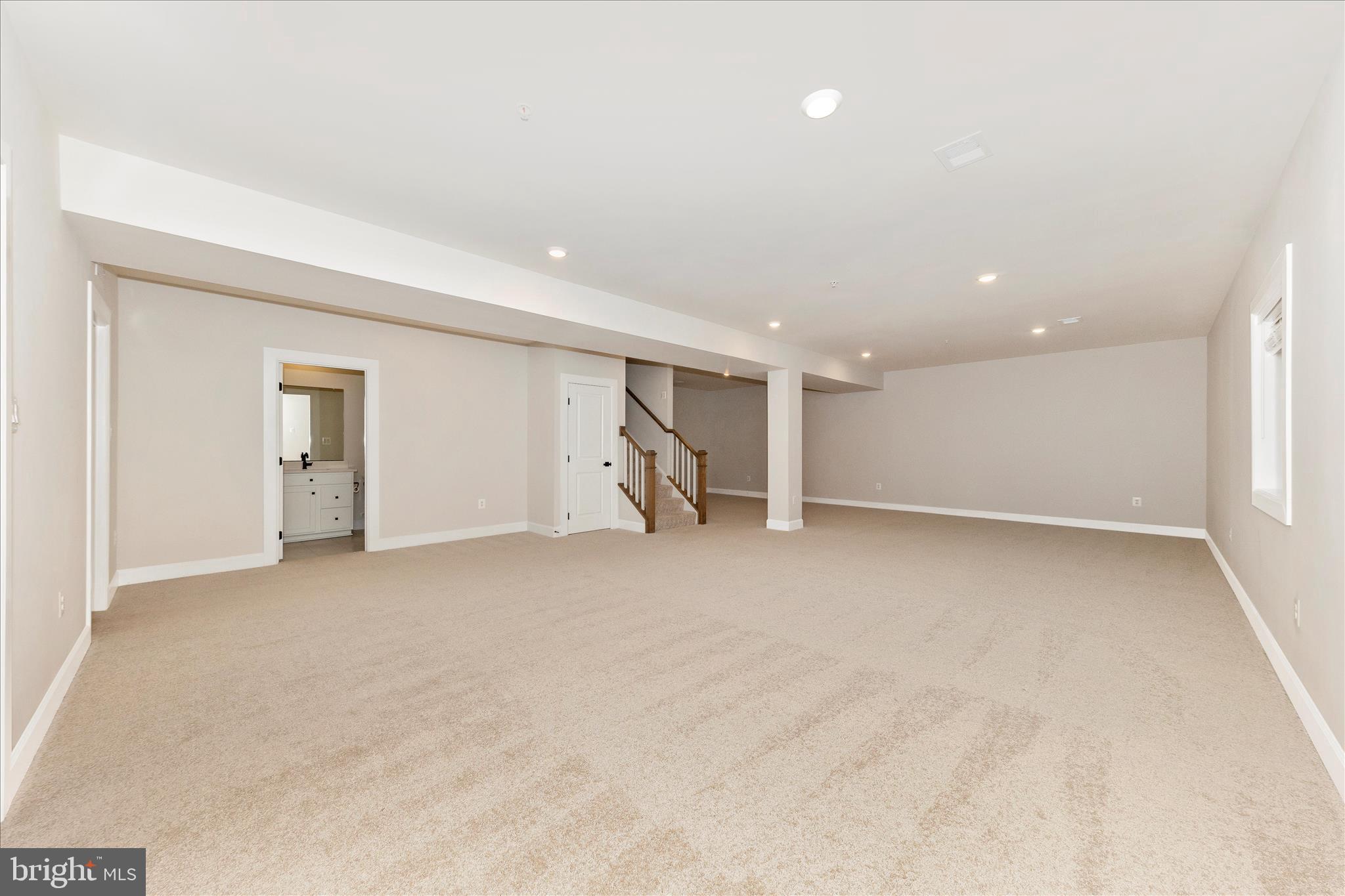 413 Bucklebury Lane Frederick, MD 21702 - Photo 41 of 58 a view of an empty room with a window