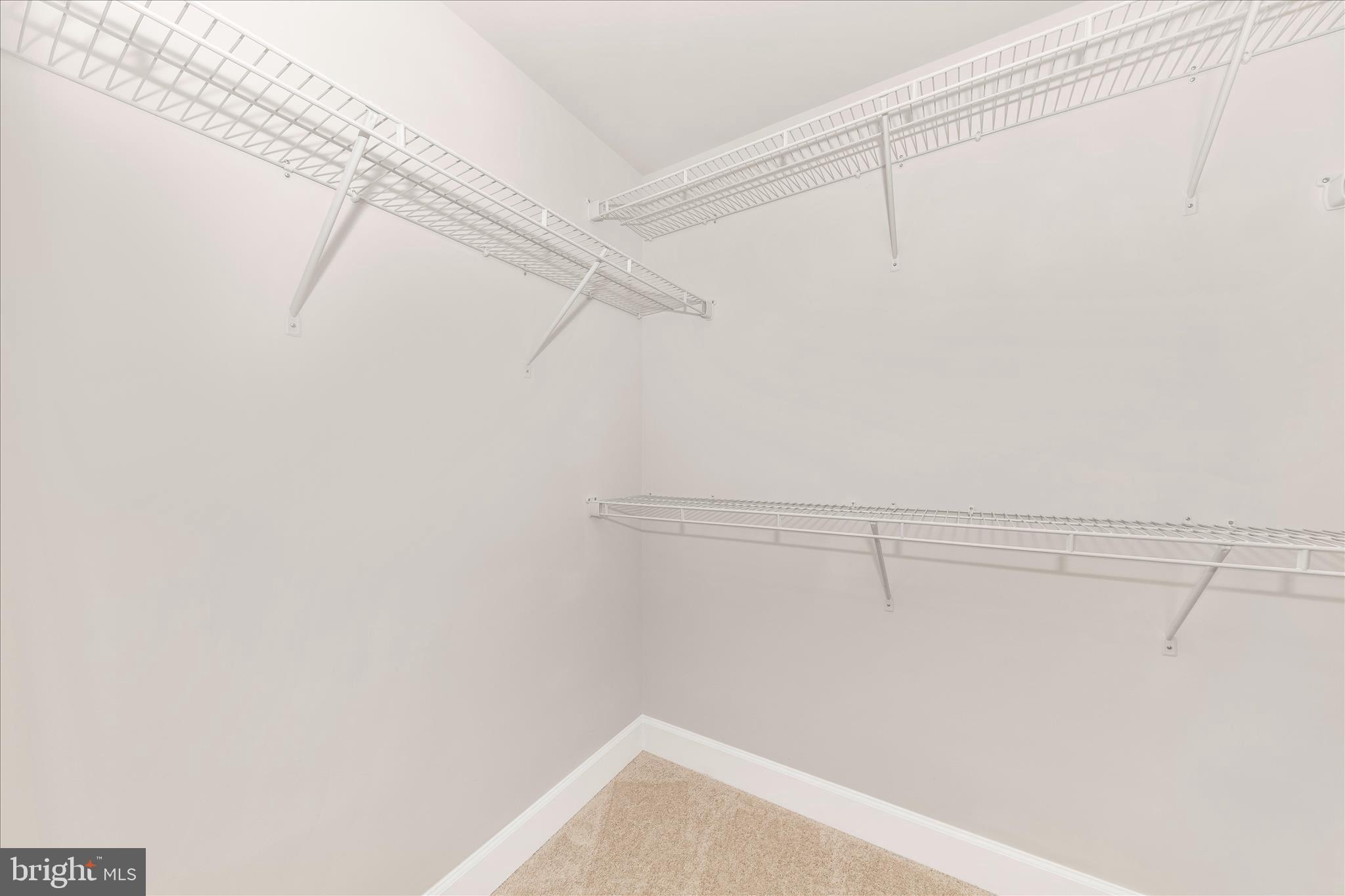 413 Bucklebury Lane Frederick, MD 21702 - Photo 45 of 58 a view of a room with racks on the wall