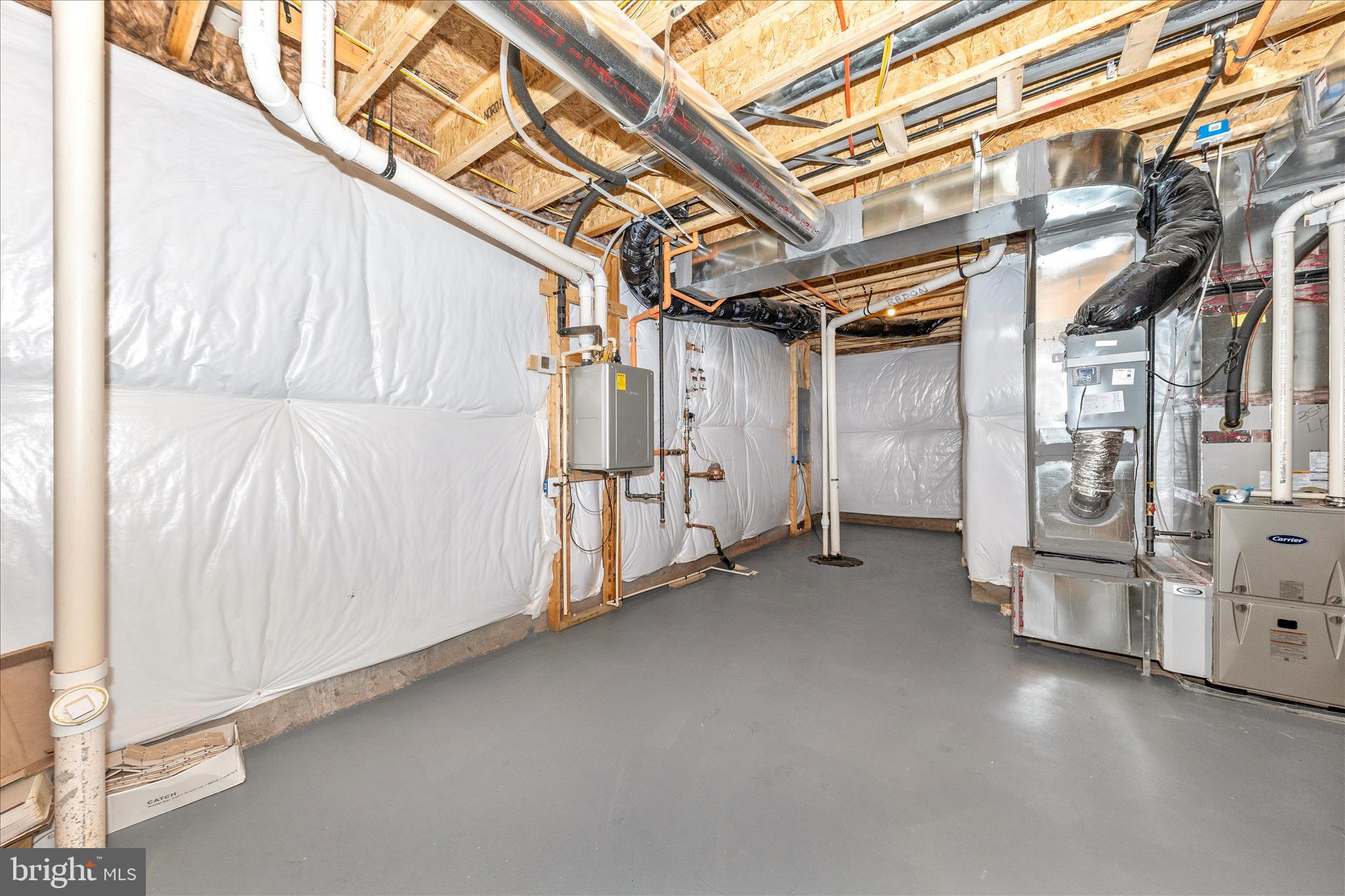 413 Bucklebury Lane Frederick, MD 21702 - Photo 47 of 58 a view of a room with racks on the wall