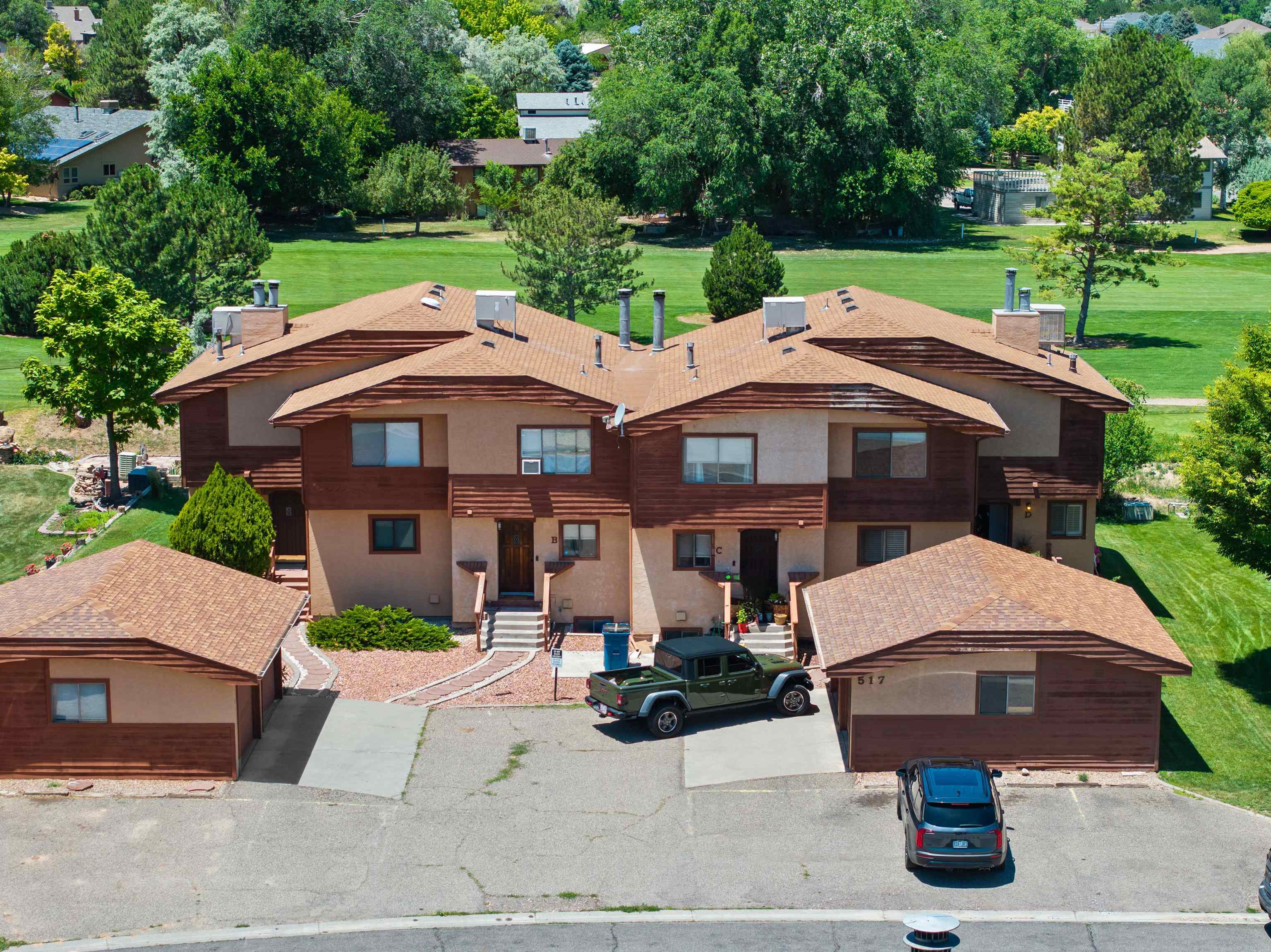 517 Rado Drive, Unit D Grand Junction, CO 81507 - Photo 23 of 24 a view of a street with houses on both side