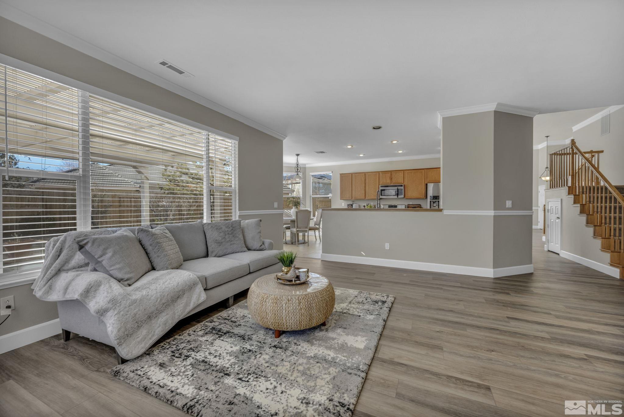 9765 Rolling Rock Court Reno, NV 89521 - Photo 15 of 39 a living room with furniture and a large window