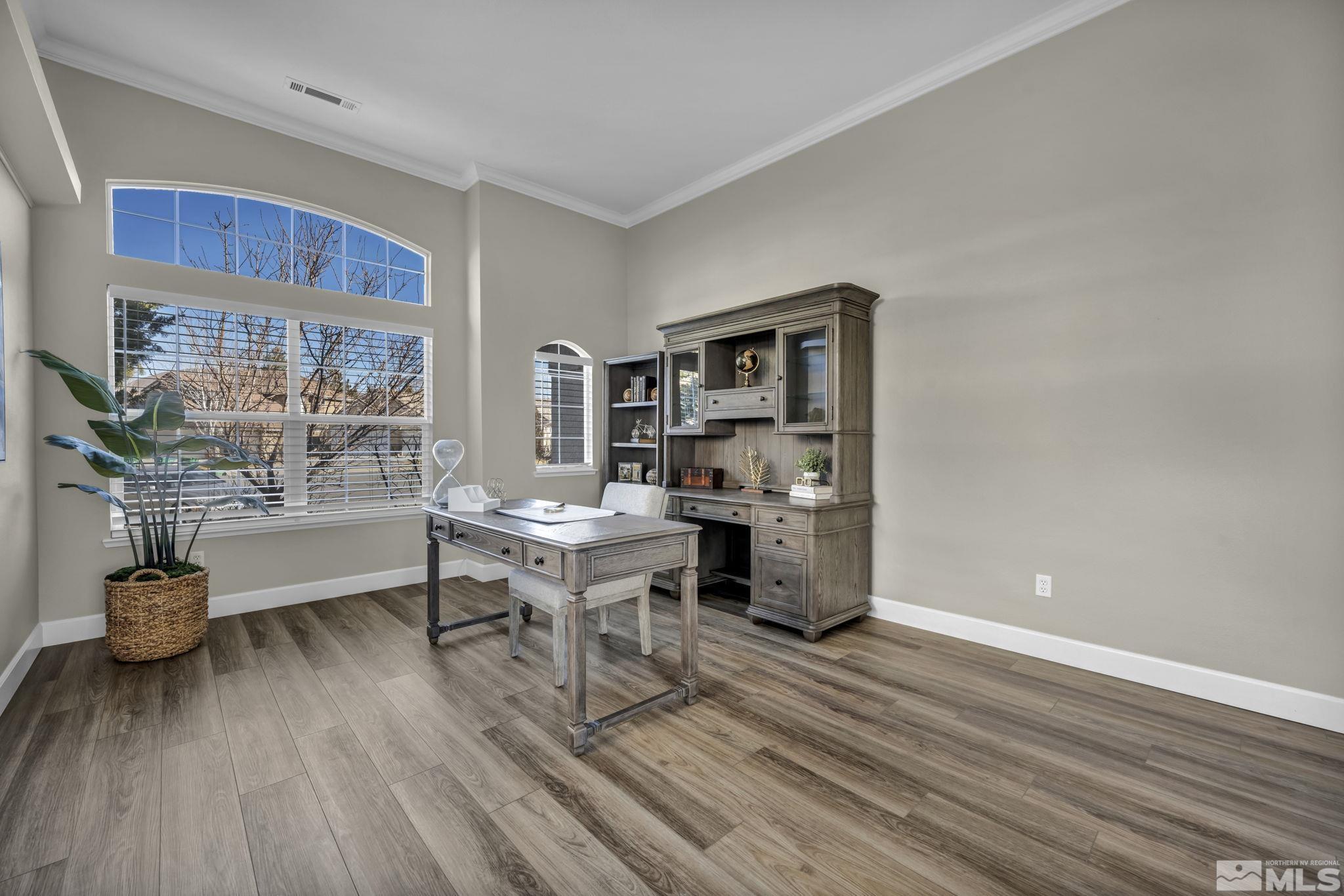 9765 Rolling Rock Court Reno, NV 89521 - Photo 16 of 39 a living room with furniture and a table