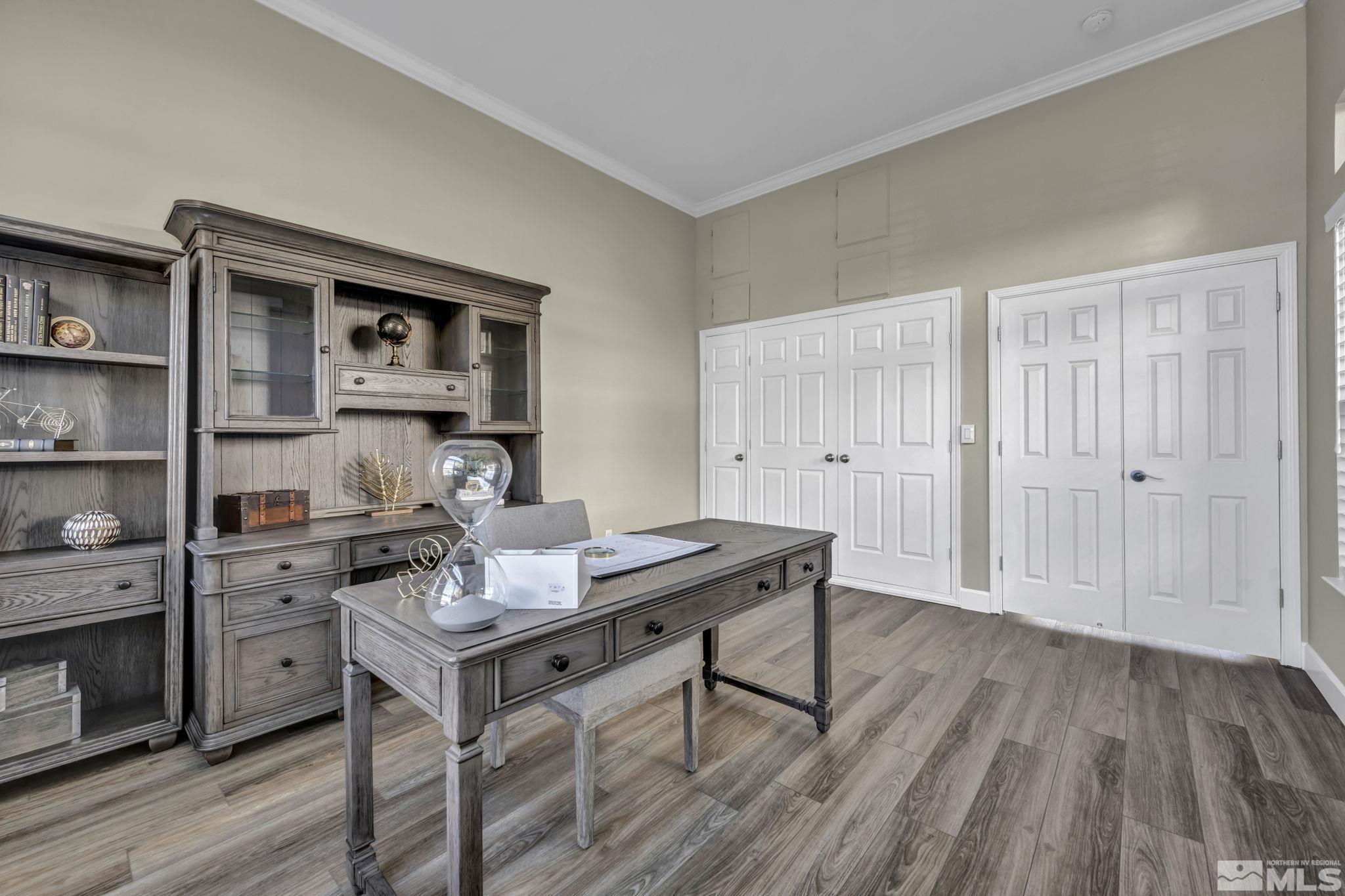 9765 Rolling Rock Court Reno, NV 89521 - Photo 17 of 39 a view of a workspace with furniture and wooden floor