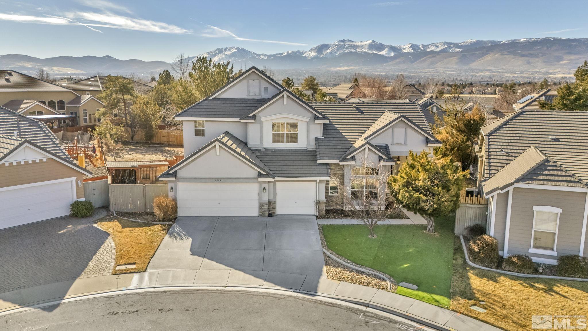9765 Rolling Rock Court Reno, NV 89521 - Photo 2 of 39 an aerial view of a house
