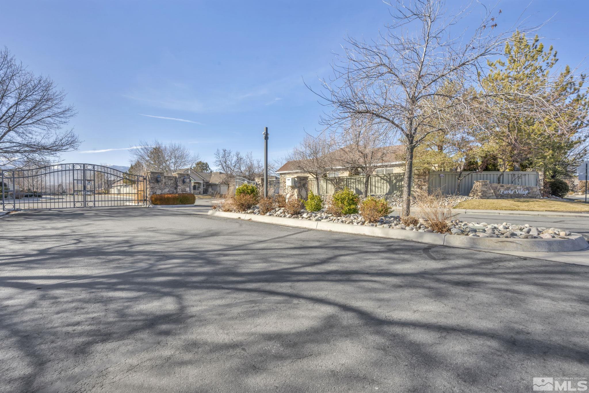 9765 Rolling Rock Court Reno, NV 89521 - Photo 39 of 39 a view of road with large trees