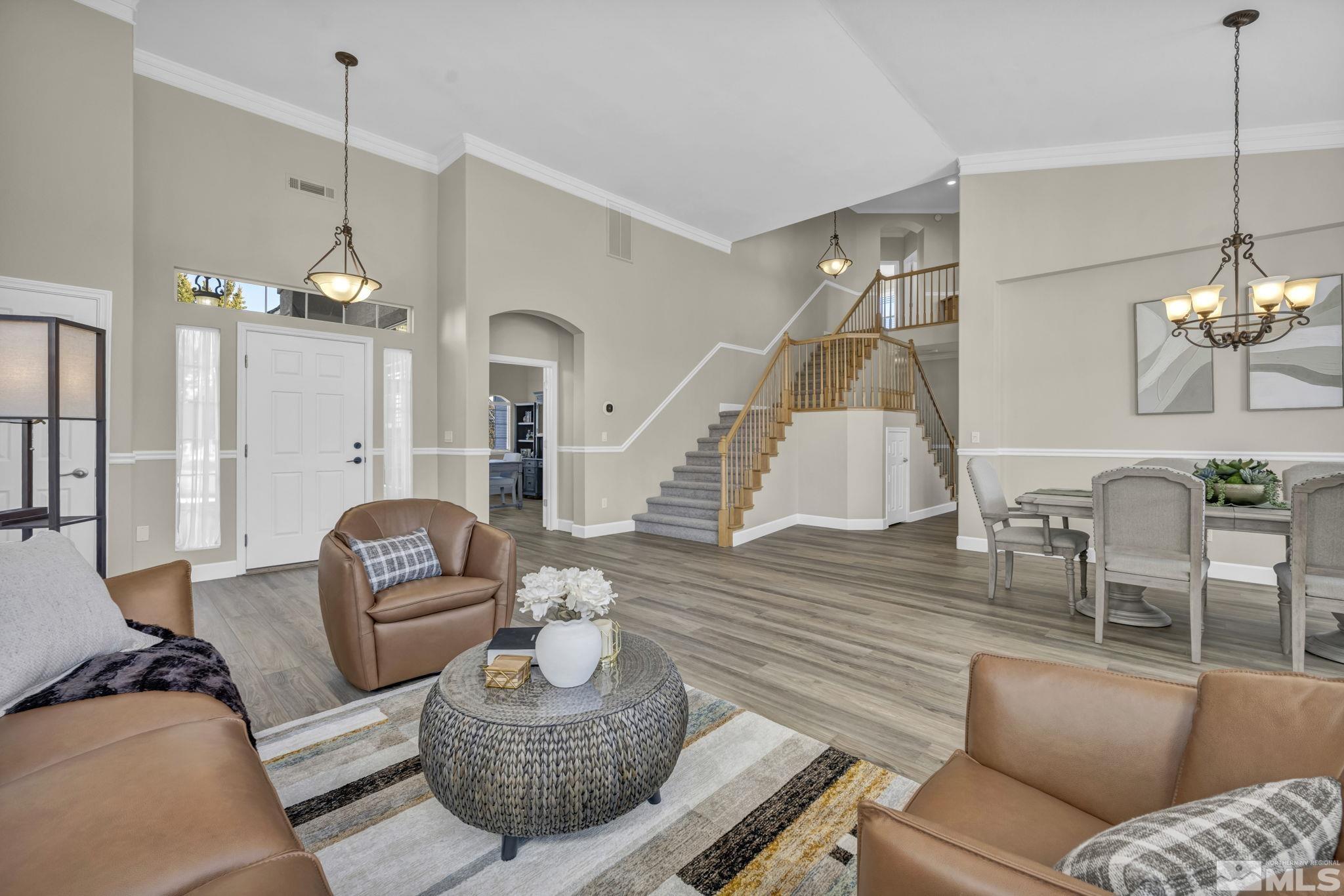 9765 Rolling Rock Court Reno, NV 89521 - Photo 5 of 39 a living room with furniture a couch and wooden floor