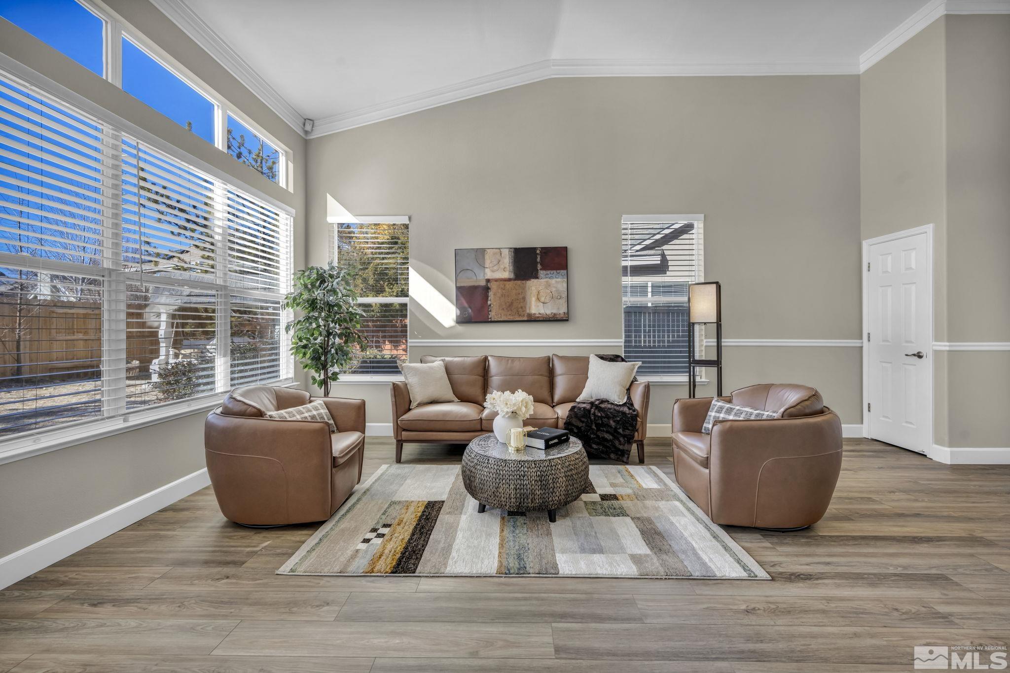 9765 Rolling Rock Court Reno, NV 89521 - Photo 7 of 39 a living room with furniture window and a wooden floor