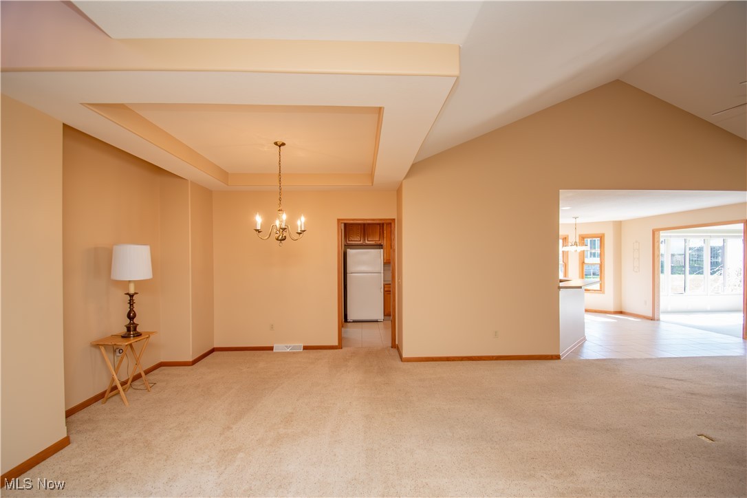 7007 Clingan Road, Unit 64 Youngstown, OH 44514 - Photo 5 of 50 Tray ceiling in Dining area.