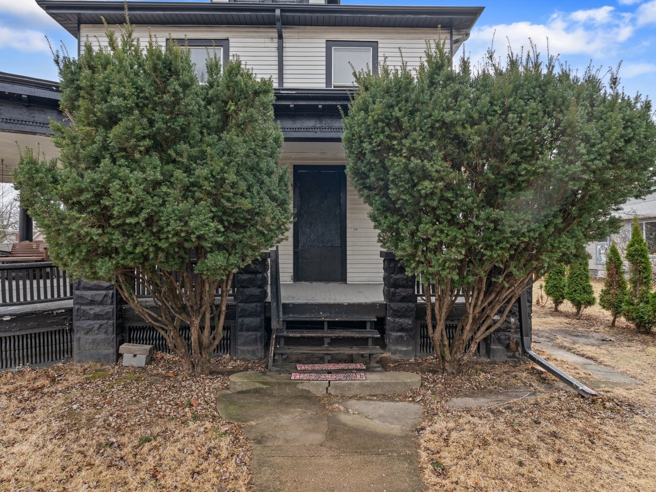 1546 12th Avenue Moline, IL 61265 - Photo 2 of 32 a front view of a house with a tree