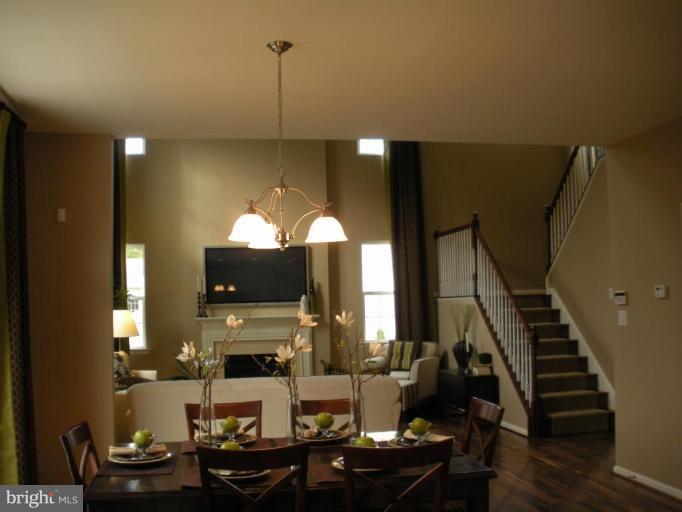 4231 Forge Road Perry Hall, MD 21128 - Photo 7 of 10 a living room with furniture and a fireplace