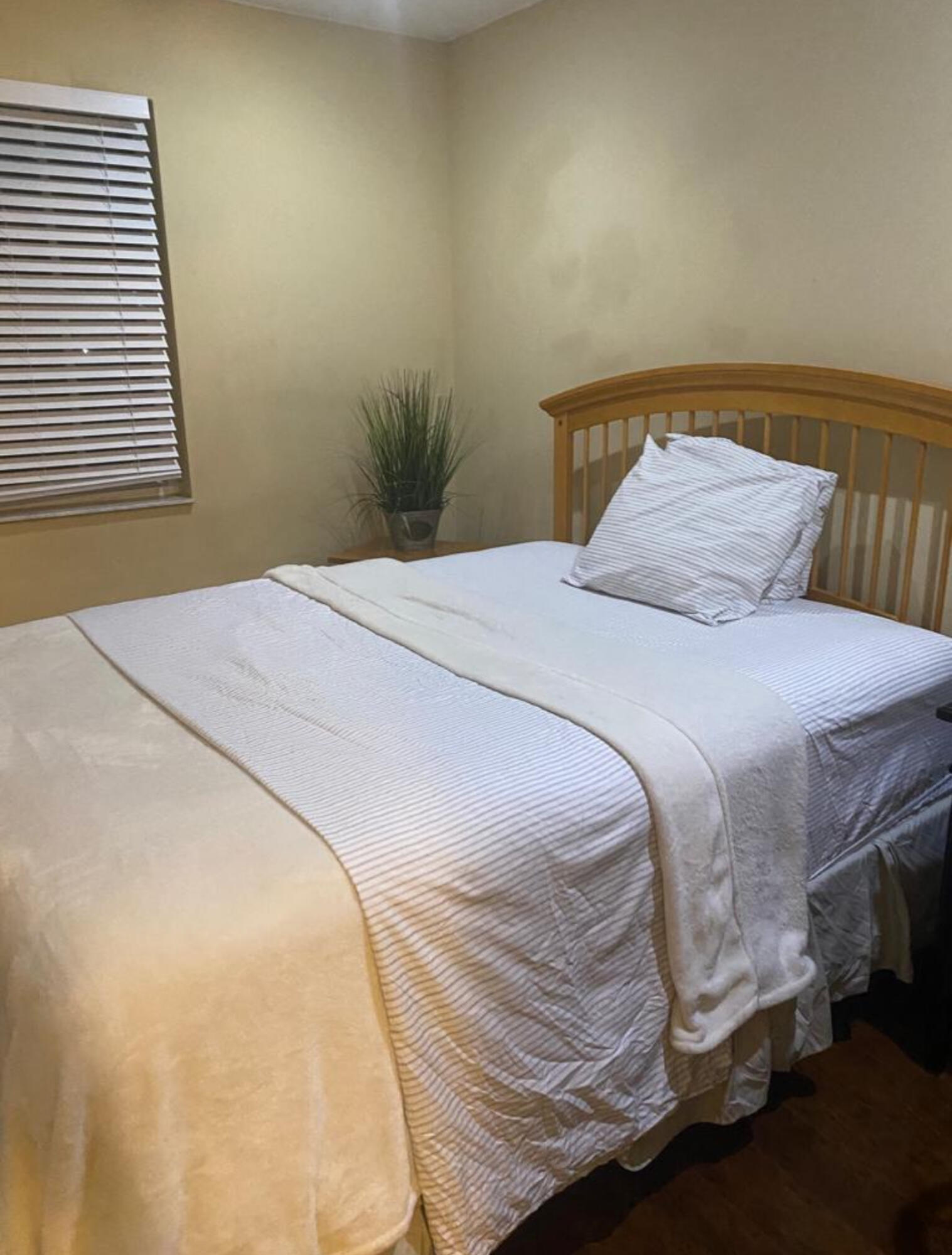 3111 Clint Moore Road, Unit 205 Boca Raton, FL 33496 - Photo 25 of 35 a bedroom with a bed and a window