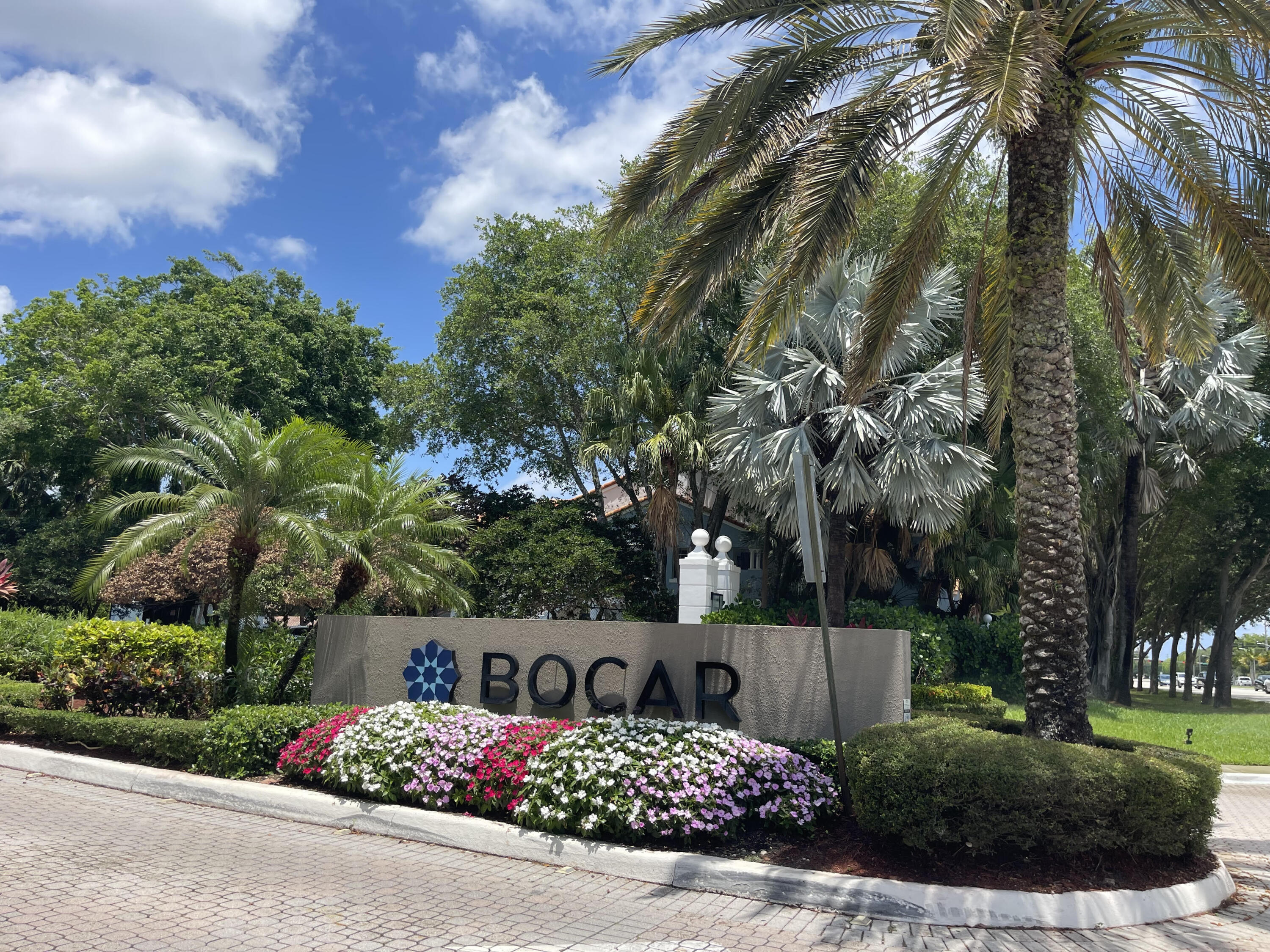 3111 Clint Moore Road, Unit 205 Boca Raton, FL 33496 - Photo 3 of 35 front view of a house with a street