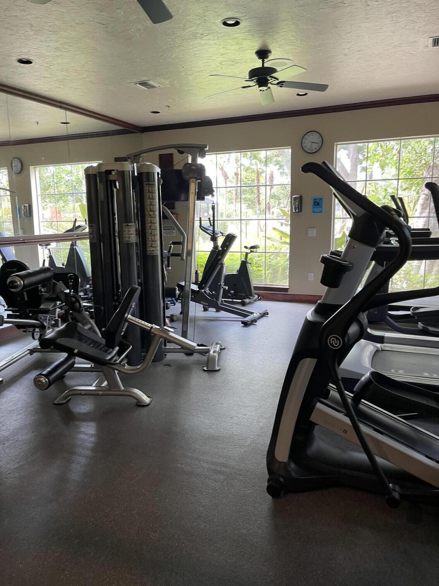 3111 Clint Moore Road, Unit 205 Boca Raton, FL 33496 - Photo 33 of 35 a view of a room with gym equipment