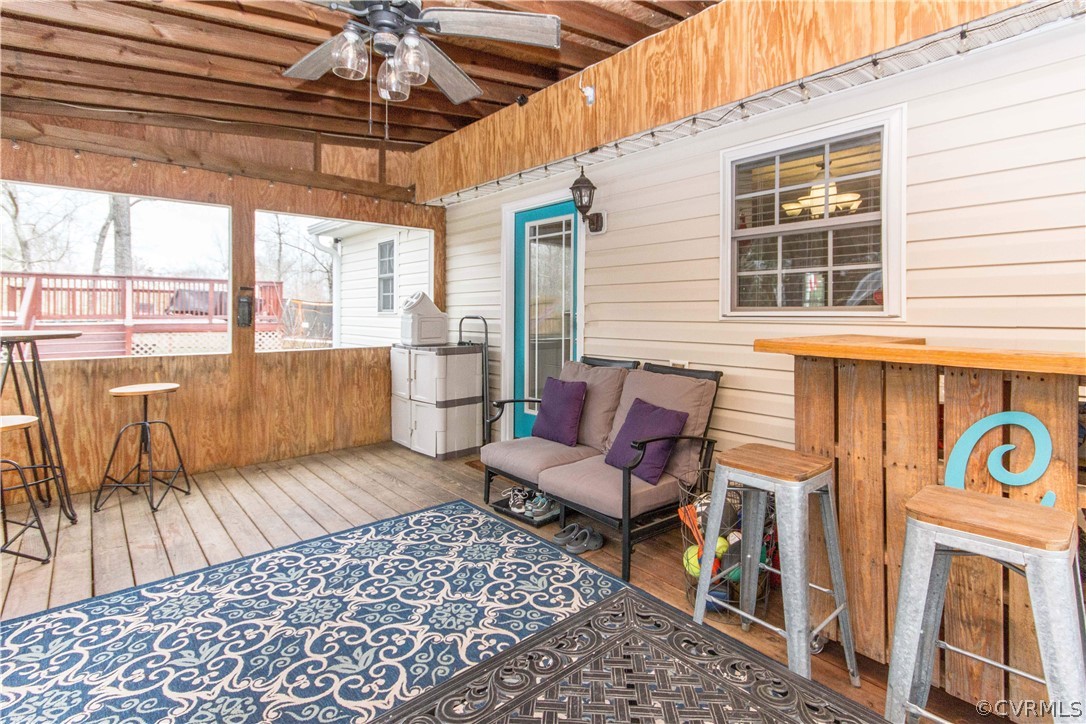 19600 Trumpeter Road Petersburg, VA 23803 - Photo 13 of 33 a view of a patio with a table and chairs