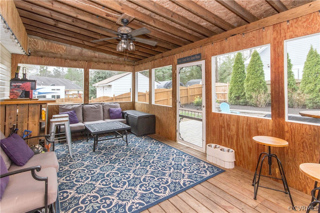 19600 Trumpeter Road Petersburg, VA 23803 - Photo 14 of 33 a outdoor space with lots of tables a large window and a rug