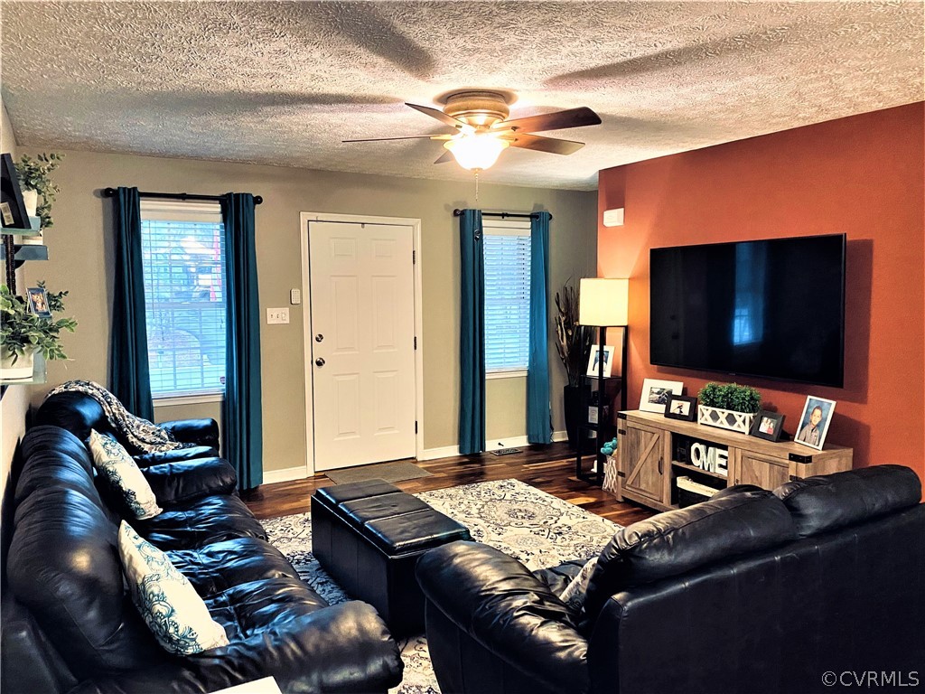 19600 Trumpeter Road Petersburg, VA 23803 - Photo 19 of 33 a living room with furniture and a flat screen tv