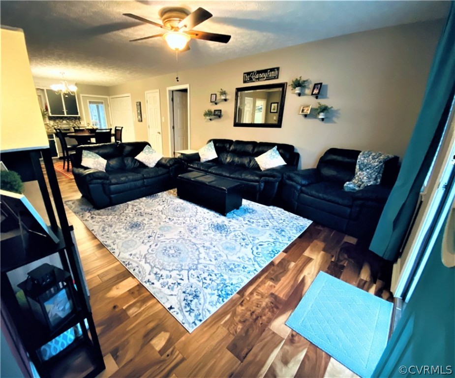 19600 Trumpeter Road Petersburg, VA 23803 - Photo 20 of 33 a living room with couches and painting on the wall
