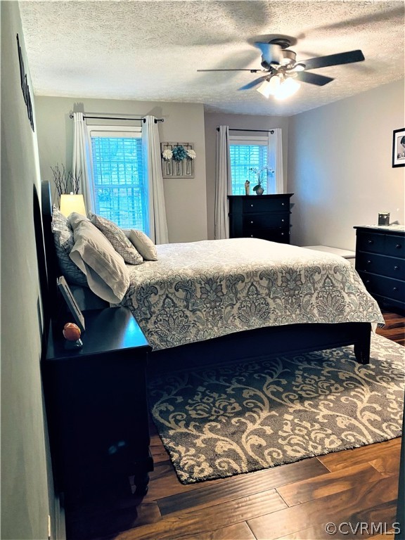 19600 Trumpeter Road Petersburg, VA 23803 - Photo 23 of 33 a bed sitting in a bedroom next to a window