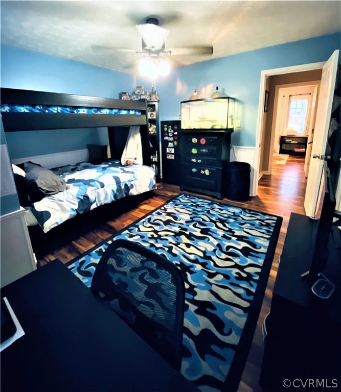 19600 Trumpeter Road Petersburg, VA 23803 - Photo 27 of 33 a bed room with a bed and a chandelier