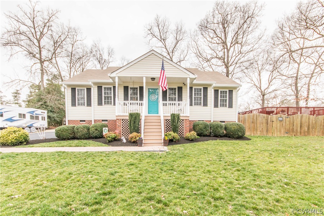 19600 Trumpeter Road Petersburg, VA 23803 - Photo 3 of 33 a front view of a house with a yard