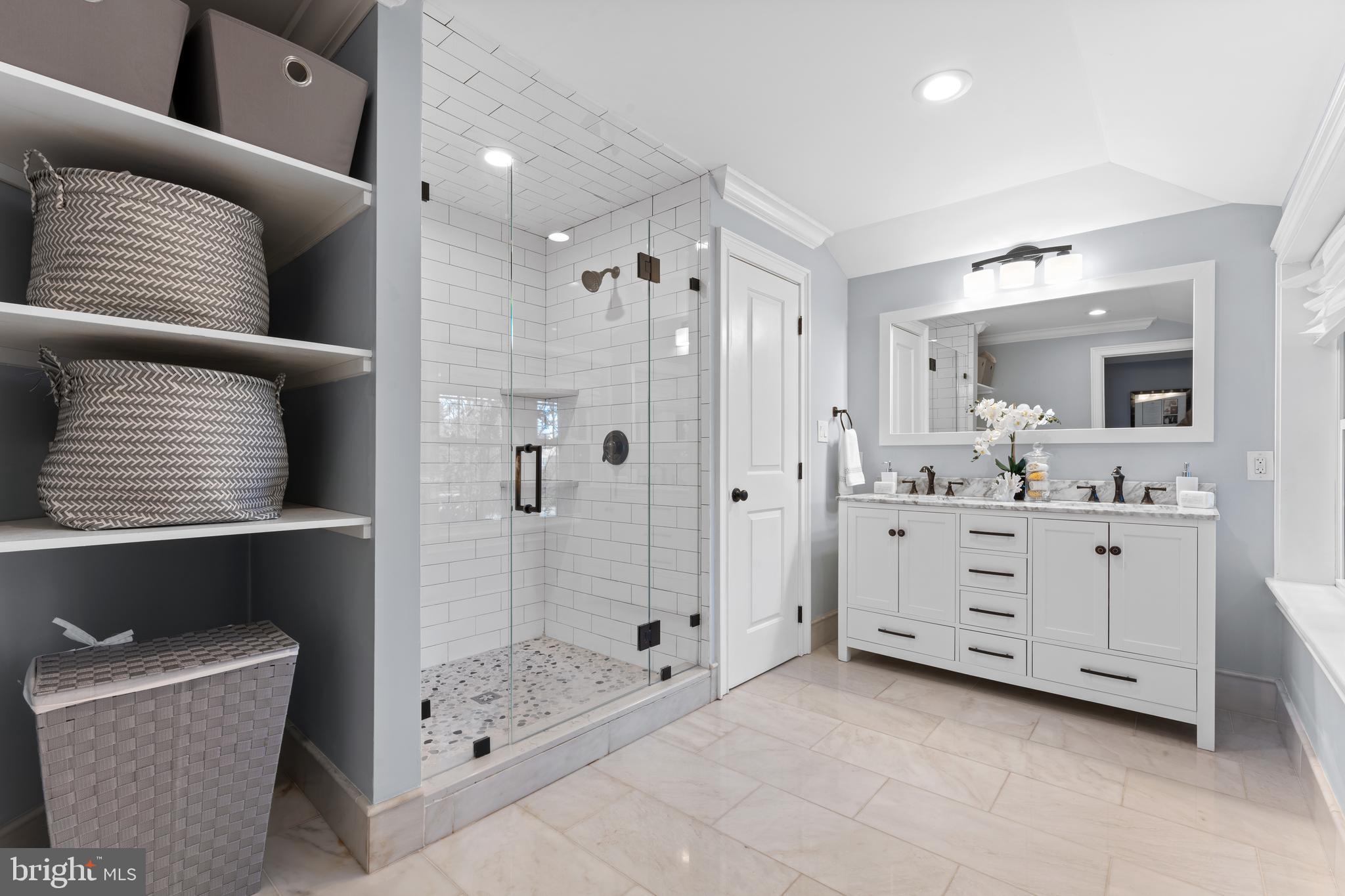334 Fairhill Road Wynnewood, PA 19096 - Photo 17 of 45 a bathroom with a double vanity sink mirror and shower
