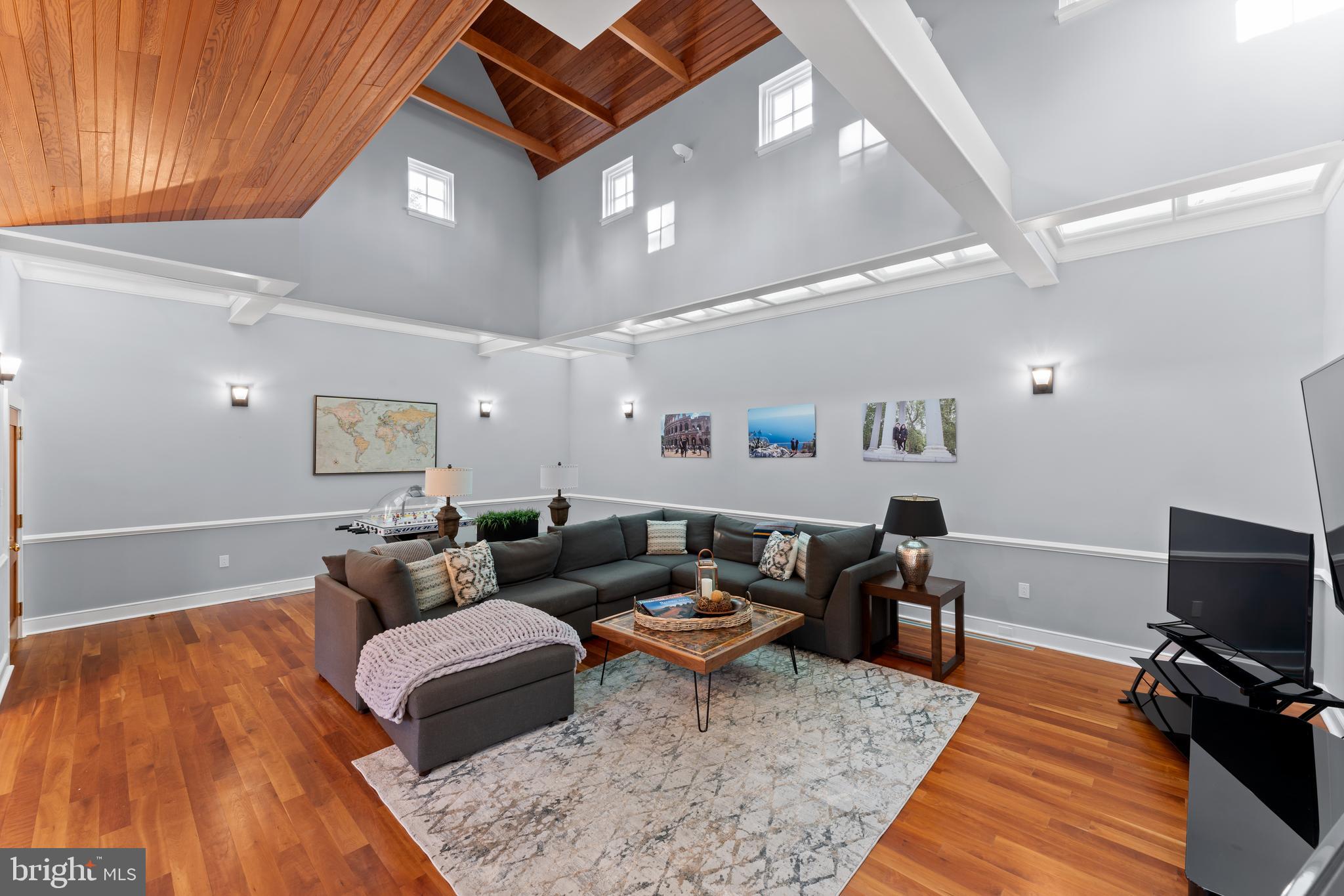 334 Fairhill Road Wynnewood, PA 19096 - Photo 19 of 45 a living room with furniture and a flat screen tv