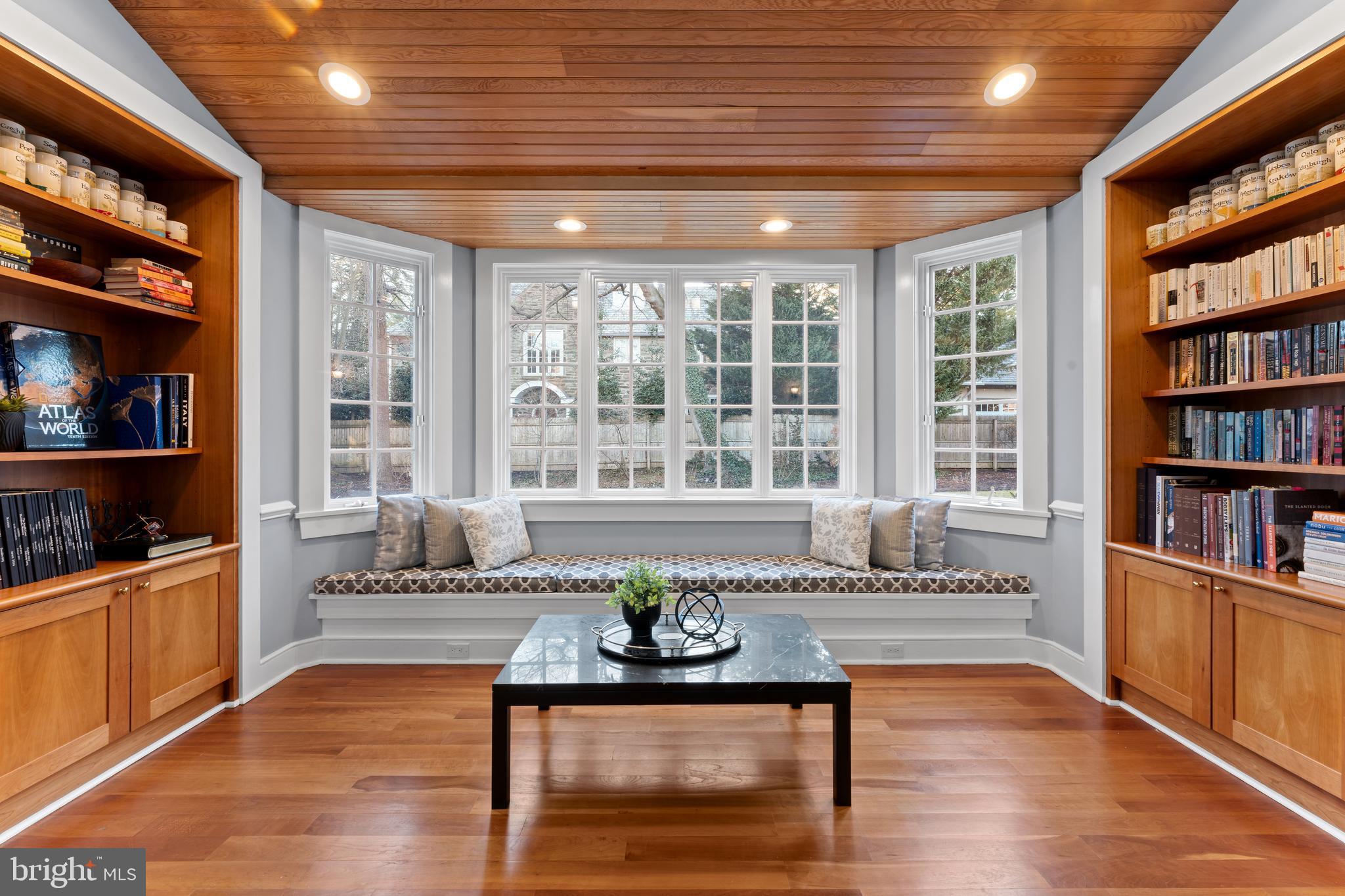 334 Fairhill Road Wynnewood, PA 19096 - Photo 20 of 45 a living room with furniture and a book shelf