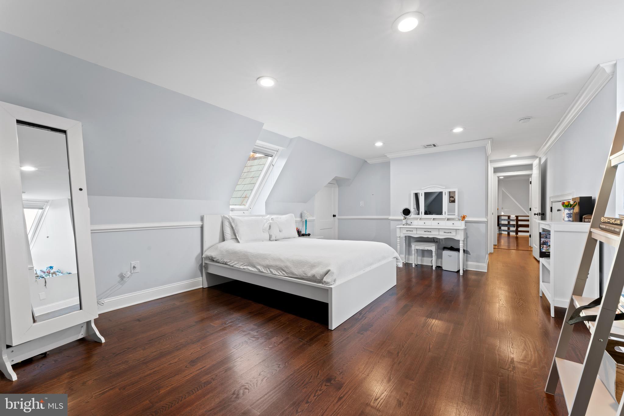 334 Fairhill Road Wynnewood, PA 19096 - Photo 28 of 45 a spacious bedroom with a bed and furniture